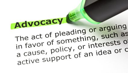 Image of the words advocacy with a green highlighter pen