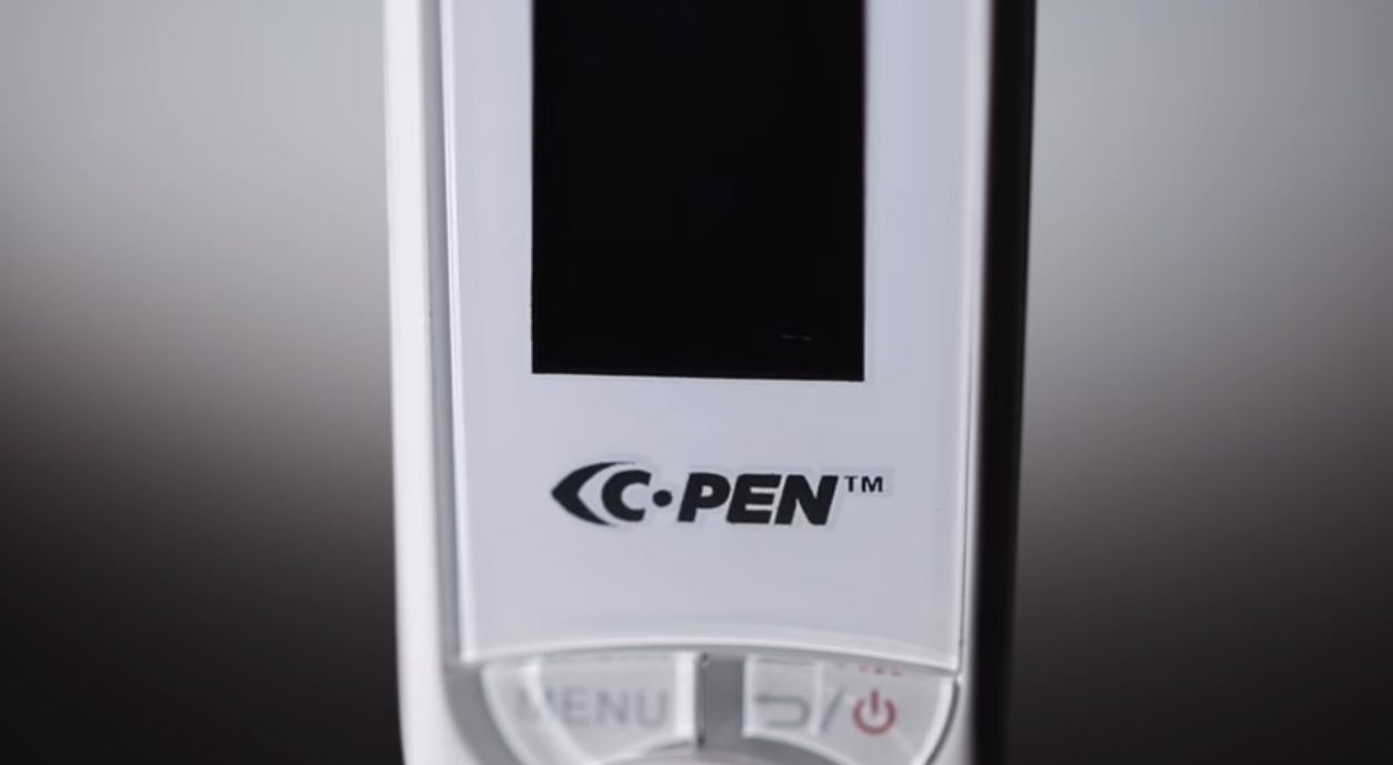 Image of a C-Pen Reader 2 in white colour placed on a table.